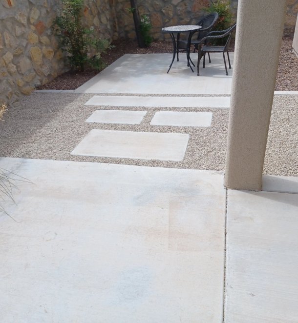 Concrete patio installation with proper drainage grading in Las Cruces