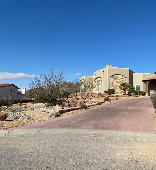 Driveway installation with proper base and drainage in Las Cruces