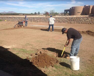 Brainard's crew grading and preparing a large residential lot for landscaping