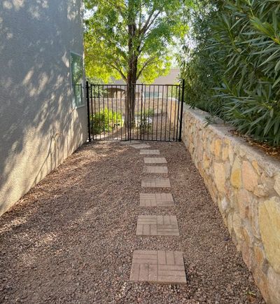 Custom paver patio installation with detailed stone work