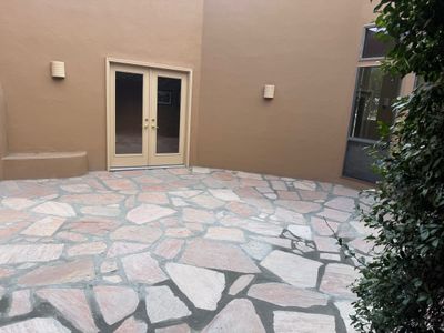 Finished flagstone patio with kiva fireplace at a Las Cruces home